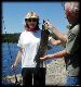 24" northern caught on black jig with white twisty-tail grub while
fishing from shore at camp.