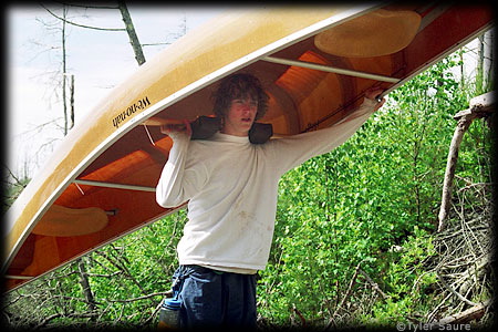 My son with our Wenonah Sundowner. Hey, it's only 42 lbs!