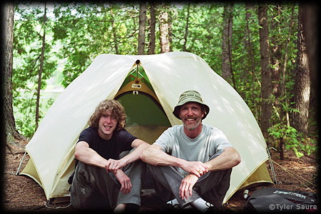 My son and my annual picture in front of our tent at base