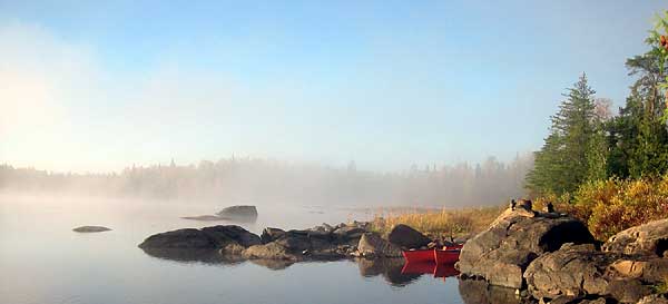 Two red canoes in the Boundary Waters